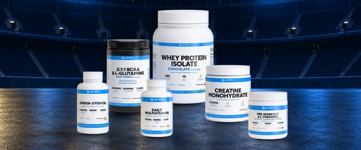 Betterly’s six Full Package products together on a floodlit stadium floor: Whey Protein Isolate, BCAA & L-Glutamine, Creatine Monohydrate, Pre-Workout & L-Theanine, Omega-3 Fish Oil and Daily Multivitamin.